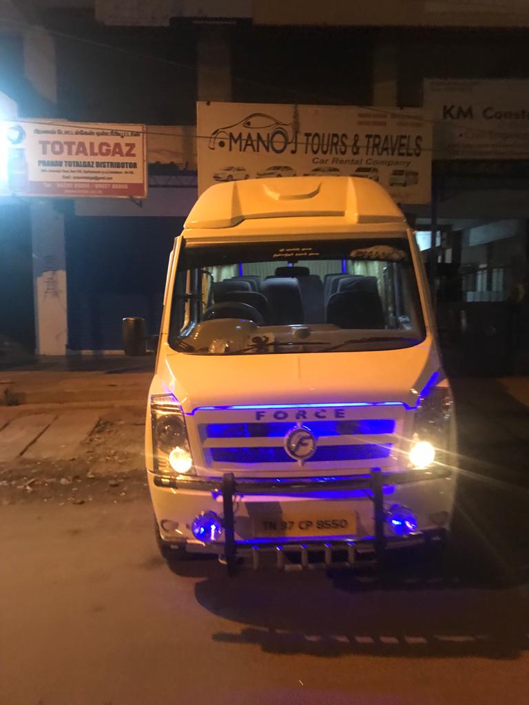 Logo of Manoj Travels - Urbania | Traveller | Mini Bus Rental in Coimbatore